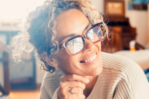 Middle-aged hispanic woman smiling with perfect teeth